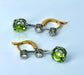 Boucles d'oreilles Paire de boucles d’oreilles en or jaune 18 carats et platine, diamants et peridots 58 Facettes AB500