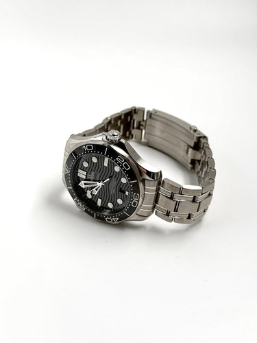 Montre OMEGA - Montre Seamaster Diver 300M 42 mm 210.30.42.20.01.001 BLACK STEEL 58 Facettes JLS