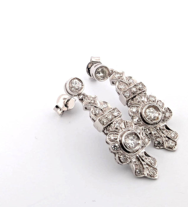 Boucles d'oreilles en or blanc avec diamants