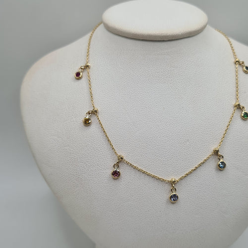 Collier Collier or jaune 18 carats serti de saphirs multi couleurs 58 Facettes