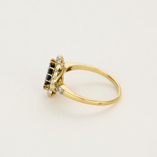 Bague 57,5 Bague marguerite en or jaune et or blanc, saphir et diamants 58 Facettes B250589