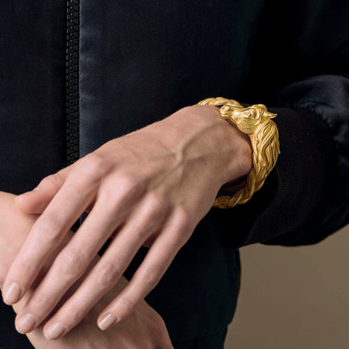 HERMES - Bracelet jonc en or jaune a motif de cheval