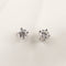 Boucles d'oreilles dormeuses en or blanc avec diamants taille brillant