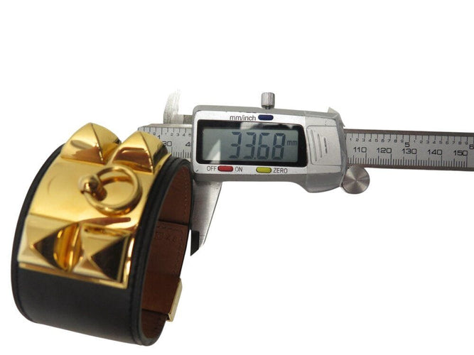 Collier bracelet HERMES collier de chien medor cdc 16cm cuir swift noir metal dore 58 Facettes 268024