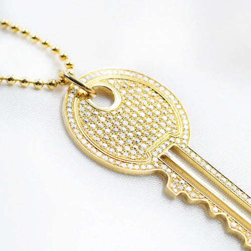 Collier Collier pendentif clé en or et diamants 58 Facettes 18134