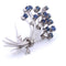 Broche Broche en or blanc 18 carats - Saphirs et diamants 58 Facettes
