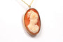 Pendentif Pendentif - Broche années 50 en or jaune, camée coquillage 58 Facettes 21437