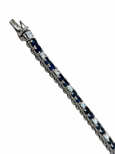 Bracelet Bracelet tennis or blanc, diamants et saphirs 58 Facettes
