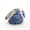 Bague 56 Bague or gris, tanzanite, entourage diamants et saphirs 58 Facettes