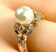 Bague 52 Bague or jaune, perle et 38 diamants 58 Facettes AB448