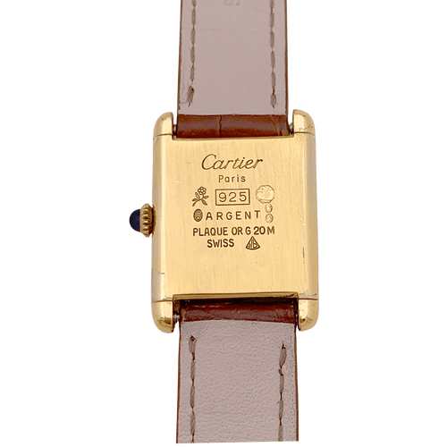 Montre Montre Cartier "Tank Must" argent plaqué or, cuir. 58 Facettes 34561