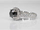 Bague 54 Bague entourage en or blanc avec gros diamants et un diamant noir 58 Facettes 2049