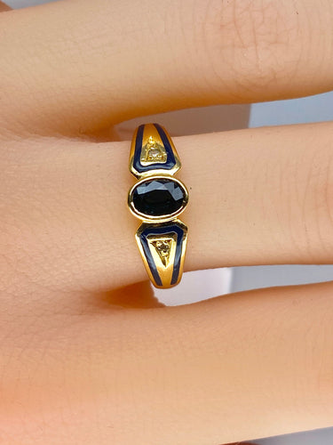 Bague saphir ovale et diamants en or jaune 18 carats et émail