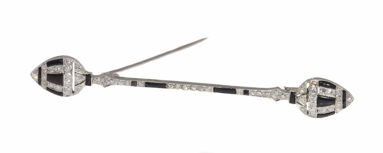 Broche Trésor des années 20 : la grâce géométrique d'une broche décorative 58 Facettes 21096-0063