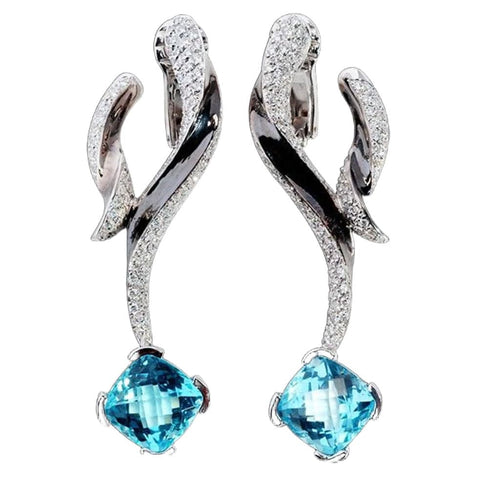 Boucles d'oreilles Boucles d'oreilles or blanc, topaze bleue, diamants naturels 58 Facettes MG-201043