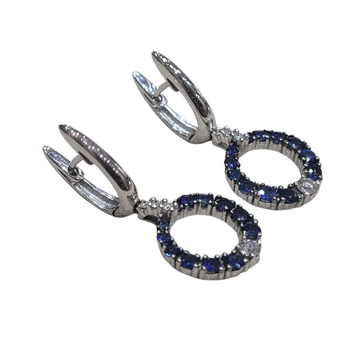 Boucles d'oreilles Boucles d'oreilles en or blanc 18 carats serties de saphirs et de diamants 58 Facettes PE697