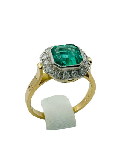 Bague 50 Bague de style Art Déco en or jaune et platine, avec une émeraude centrale et des diamants 58 Facettes 50243