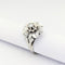 Bague 54 Bague florale en or blanc et diamant 58 Facettes 32109