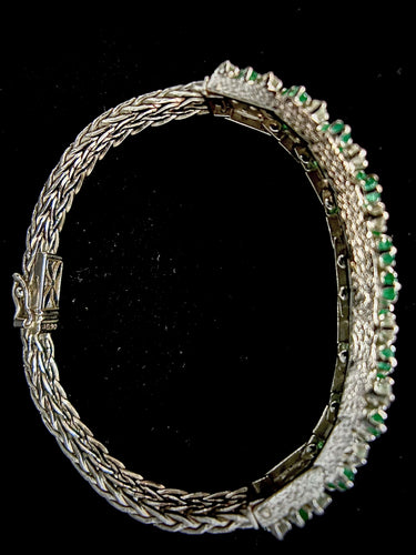 Bracelet Bracelet or blanc orné d'un pavage de brillants et émeraudes 58 Facettes