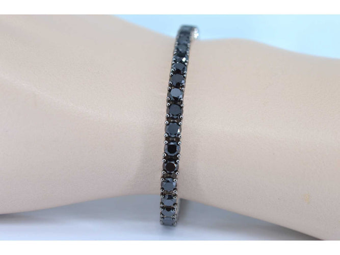 Bracelet Bracelet tennis en or blanc serti de diamants noirs tout autour 58 Facettes 2117