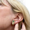 Boucles d'oreilles Boucles d'oreilles au design contemporain en or avec diamants et émeraude 58 Facettes Q289B