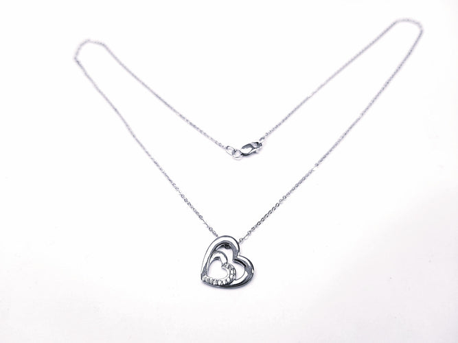 Collier Collier pendentif cœur diamant or blanc 58 Facettes Pend.Col.Coeur.B