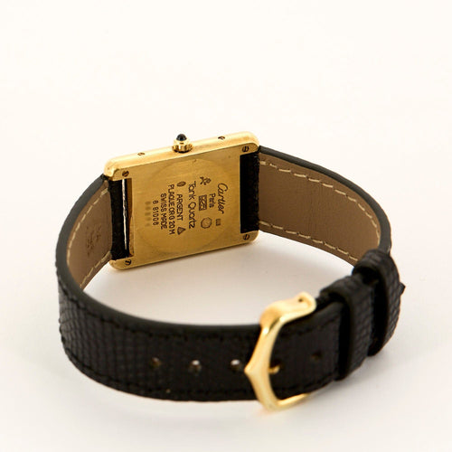 Montre Cartier - Montre Modèle "Tank Must" en argent, plaqué or et cadran noir. 58 Facettes