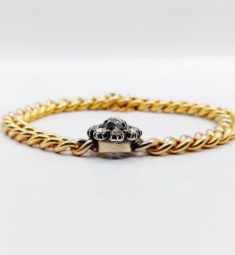 Bracelet Bracelet or jaune et argent, marguerite ornée de diamants 58 Facettes A05479