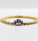 Bracelet Bracelet or jaune et argent, marguerite ornée de diamants 58 Facettes A05479