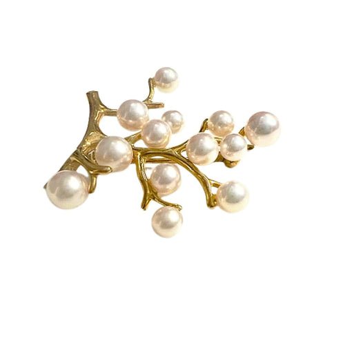 Broche Broche contemporaine en or 18 carats ornée de perles 58 Facettes Q90B(942)