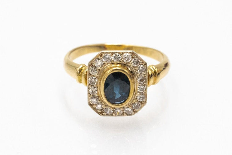 Bague 59 Bague géométrique en or ornée de saphirs et de diamants. 58 Facettes 11260