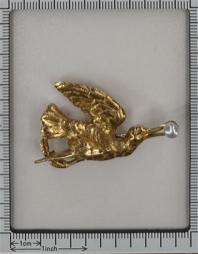 L'élégance en vol : la broche-pendentif cigogne victorienne