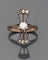 Bague 54 Bague "nœud stylisé" en or jaune, argent et diamants, vers 1900 58 Facettes 217111