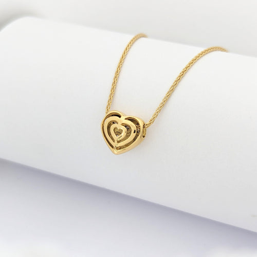 Collier cœur en or jaune et diamants