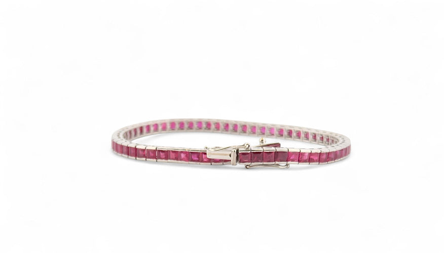 Bracelet Bracelet tennis en or blanc 18 carats et rubis 58 Facettes
