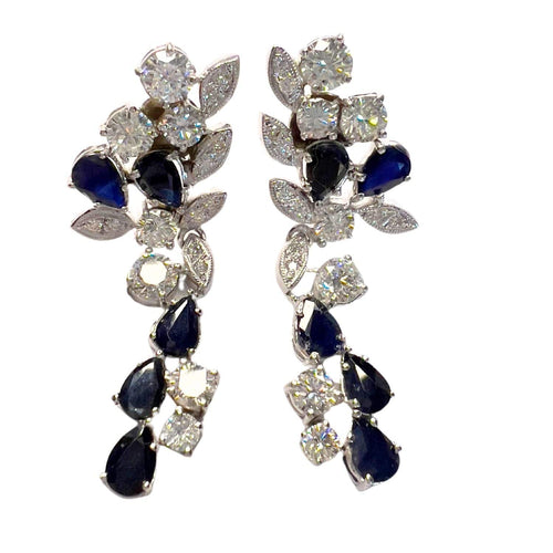 Boucles d'oreilles Boucles d'oreilles design années 1950 en platine sterling avec diamants et saphir. 58 Facettes Q352B