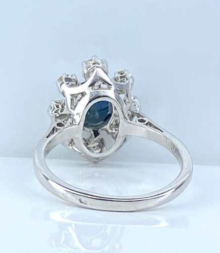 Bague 53 Bague marguerite en or blanc, saphir et diamants 58 Facettes AB644