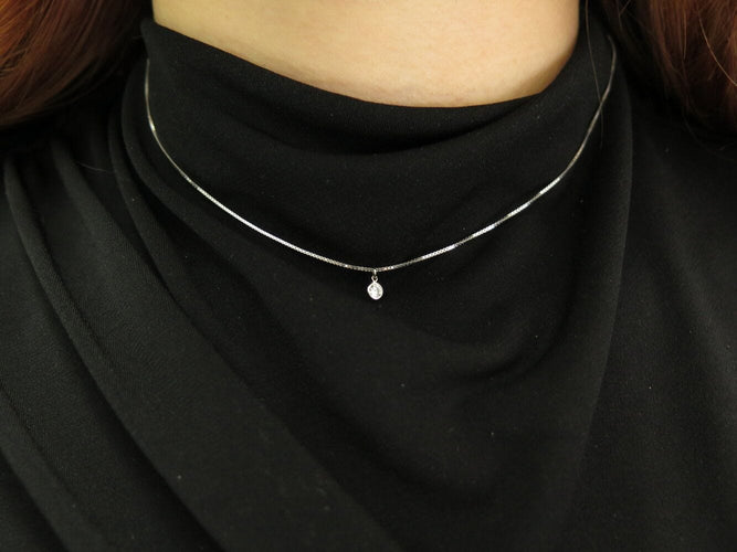 Collier collier ATELIER VM chaine l'essenziale +charm mantra diamant or blanc 58 Facettes 269552