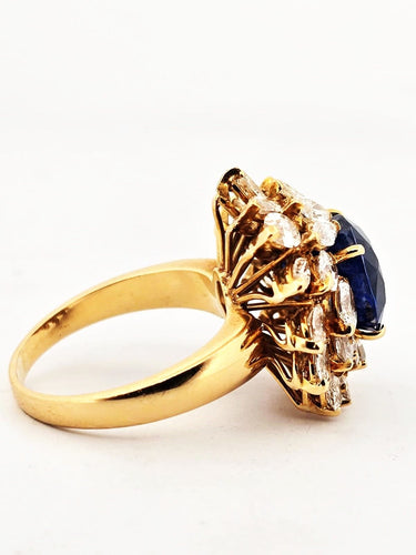 Bague 56 Bague en or jaune 1543 sertie d'un saphir 58 Facettes