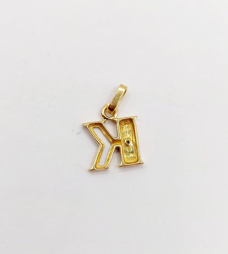 Pendentif Petit Pendentif vintage or jaune, lettre K, petit diamant 58 Facettes A06071