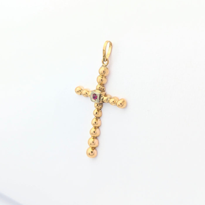 Pendentif croix en or jaune et rubis