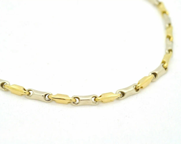 Bracelet Bracelet en or jaune et blanc 58 Facettes 8276