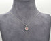 Collier Collier en or blanc avec rubis du Mozambique de 0,60 ct et diamants 58 Facettes 9791