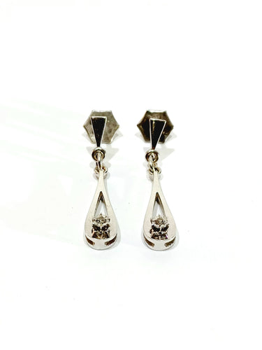 Paire de boucle d’oreille en or blanc et diamants