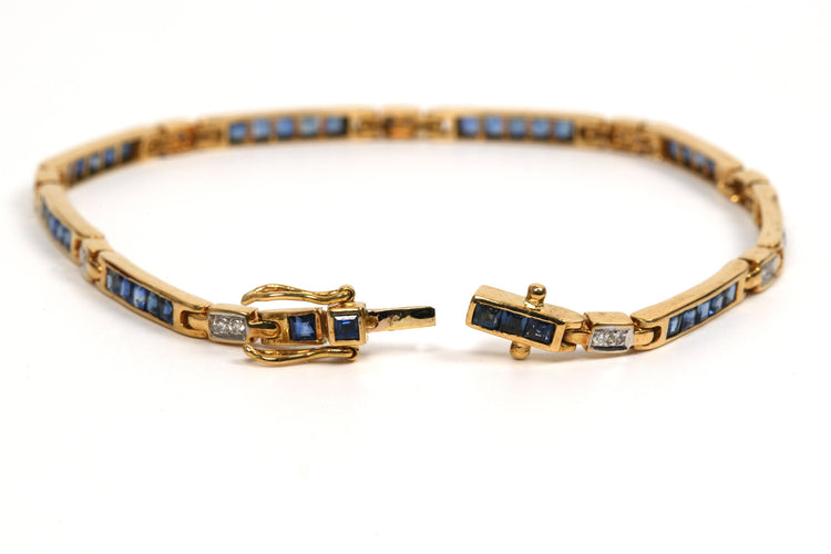 Bracelet Bracelet contemporain or jaune, saphirs, diamants 58 Facettes B475