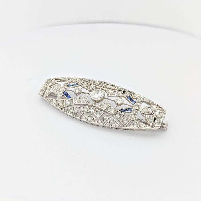 Broche Broche en or blanc et platine diamants et saphirs 58 Facettes 29571