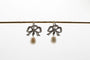 Boucles d'oreilles Boucles d'oreilles or blanc Noeuds perles et diamants 58 Facettes 5864