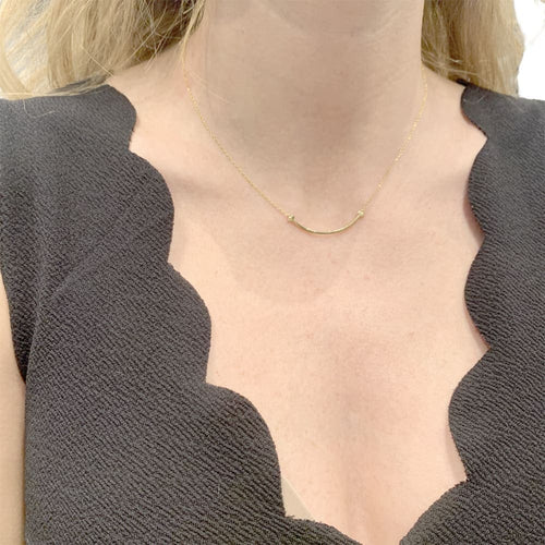 Collier Collier Tiffany & Co., "Tiffany T Smile", or jaune. 58 Facettes 35120