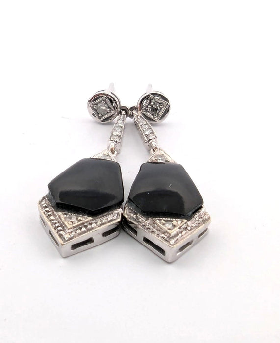 Boucles d'oreilles en or blanc avec diamants et onyx