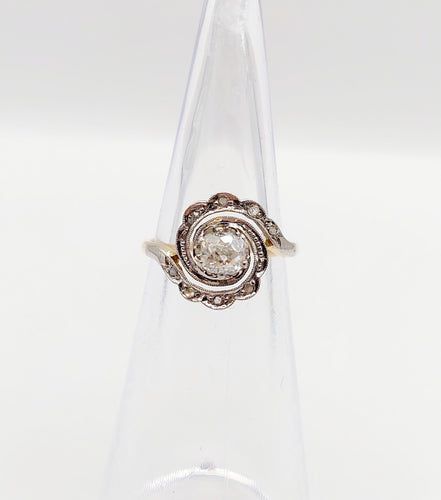 Bague 43 Bague tourbillon antique en or 18k et platine, diamant ancien 0,30 ct et roses 58 Facettes A06352